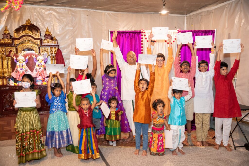 Class photo showing off their certificates