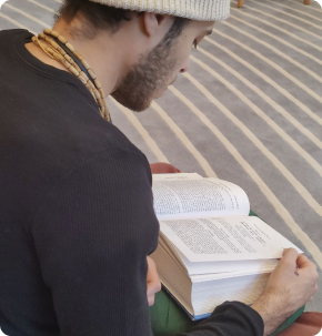 Devotee reading scripture