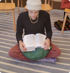 Devotee meditating with sacred text
