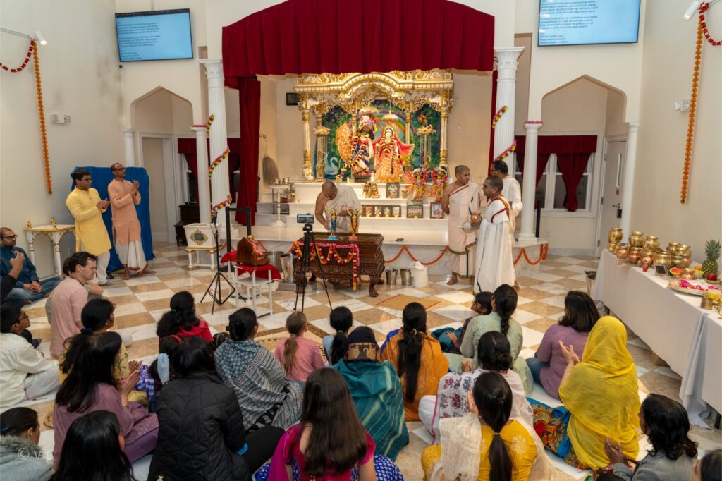 Audience seated in temple